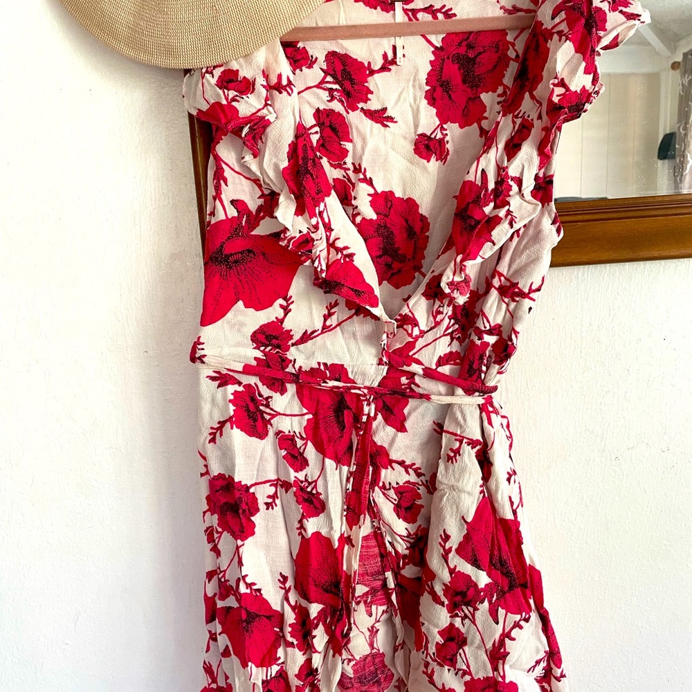 Pretty FREE PEOPLE floral flutter sleeve wrap dress